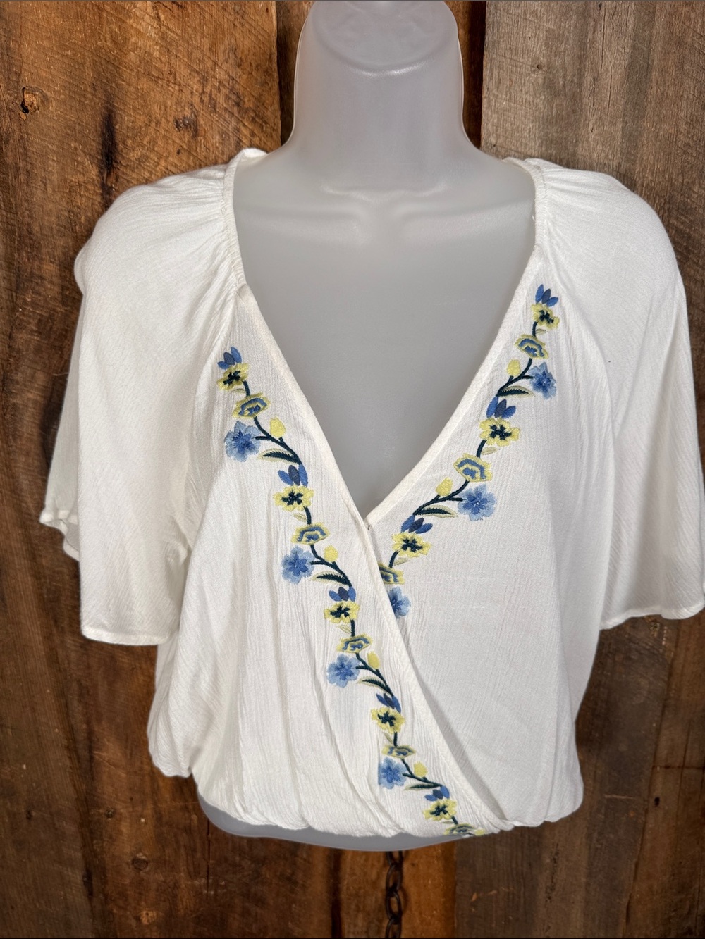 Chloe & Katie White V-Neck Blouse with Blue and Yellow Floral Embroidery